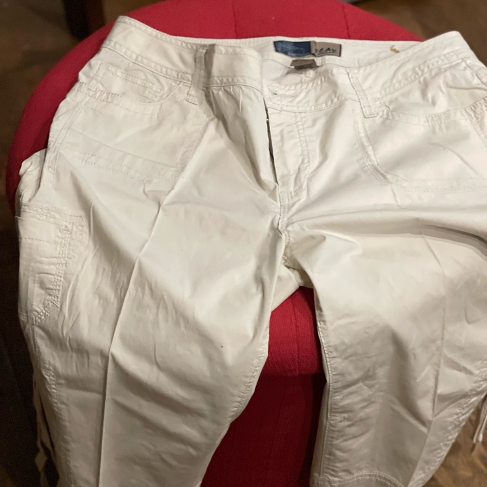 Khaki capri’s with leg embroidery and ties at the hem.